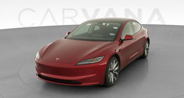 2025 Tesla Model 3 Long Range Rear-Wheel Drive in Ultra Red — photo 1