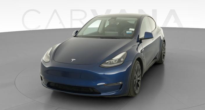2022 Tesla Model Y Performance All-Wheel Drive in Deep Blue Metallic — photo 1